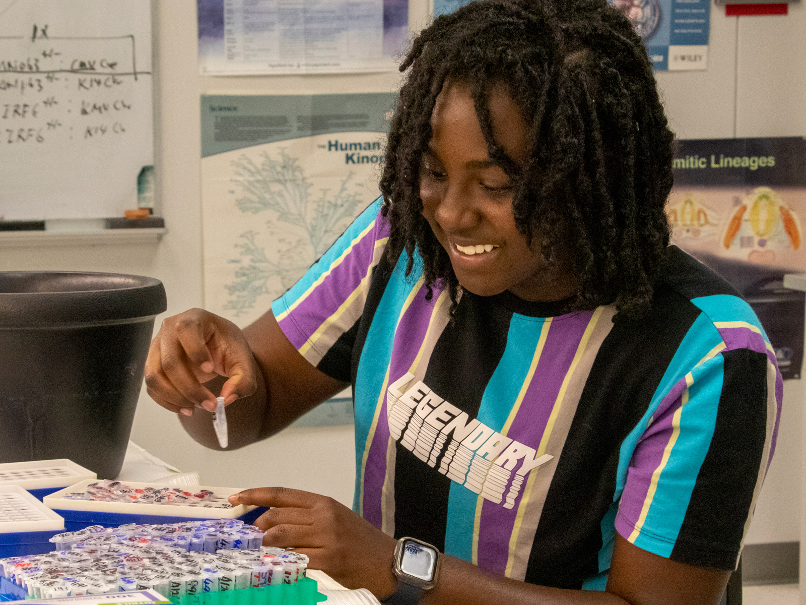 Student labels test tubes