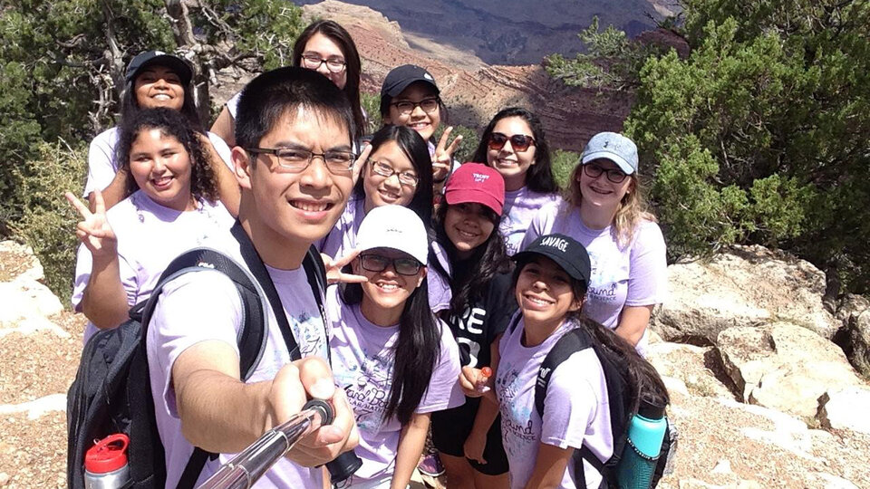 Group of students out hiking on trip